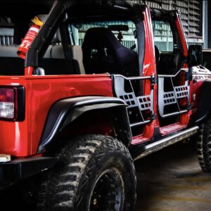 Red Jeep JK Wrangler Unlimited, modified with lift, flares, tube doors, roof removed